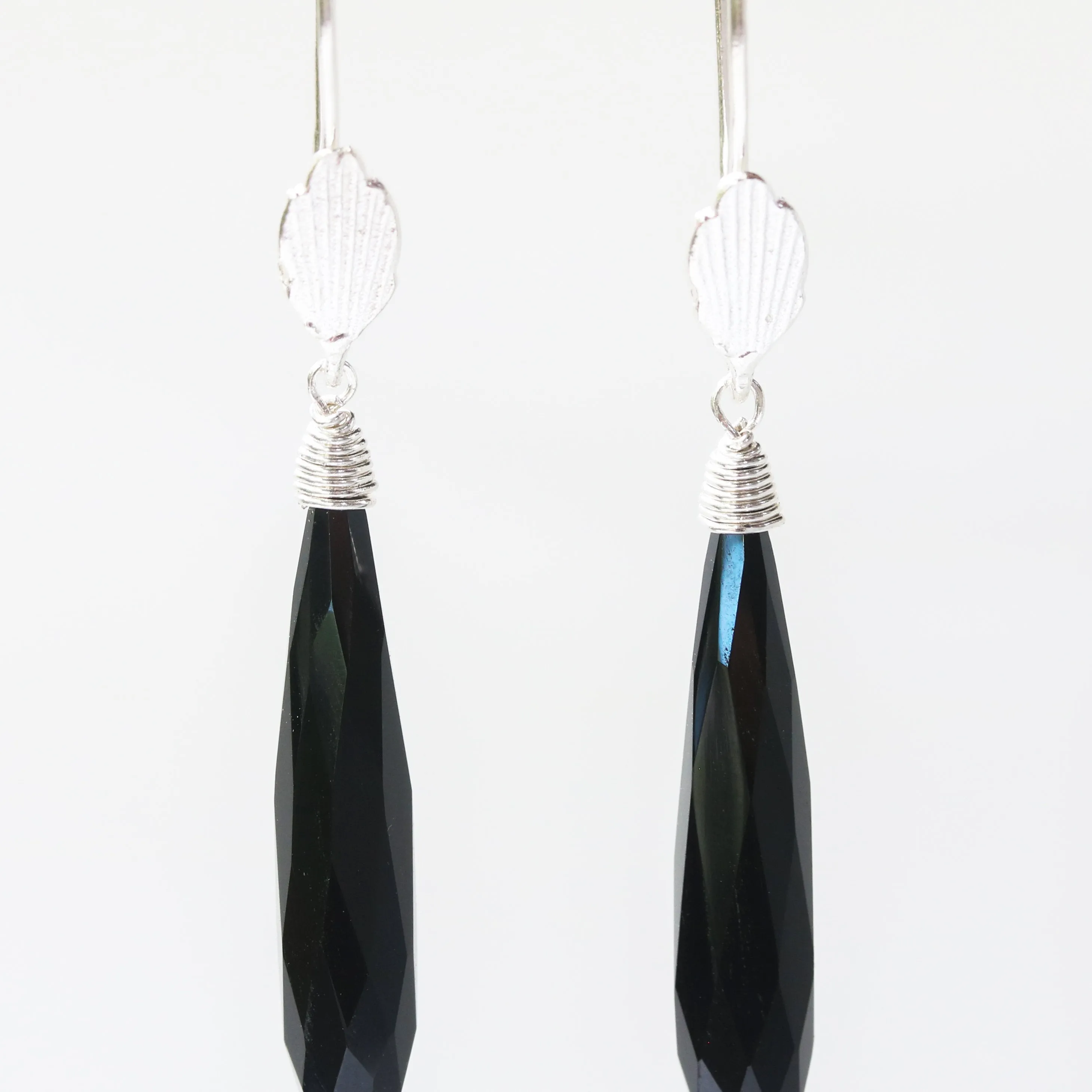 Black onyx earrings with silver wire wrapped on sterling silver hooks leaf design style