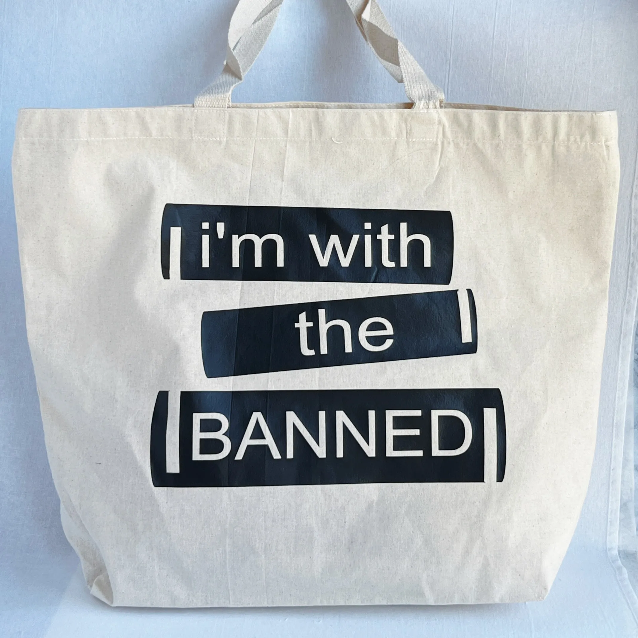 I'm with the Banned tote bag