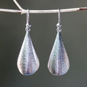 Silver leaf shape earrings with textured on oxidized sterling silver hooks style