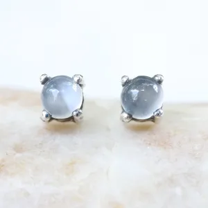 Sterling silver stud earrings with cabochon white moonstone in prongs setting with sterling silver post and backing